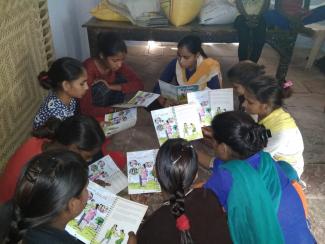 Participants of PAnKH Program, during a session using the PAnKH Diary, in Gujjra Khurd village of Dholpur district in Rajasthan, India. © ICRW