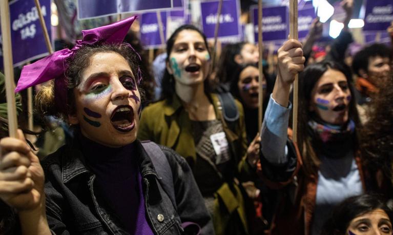 Women taking part in a protest. © Getty/Carnegie