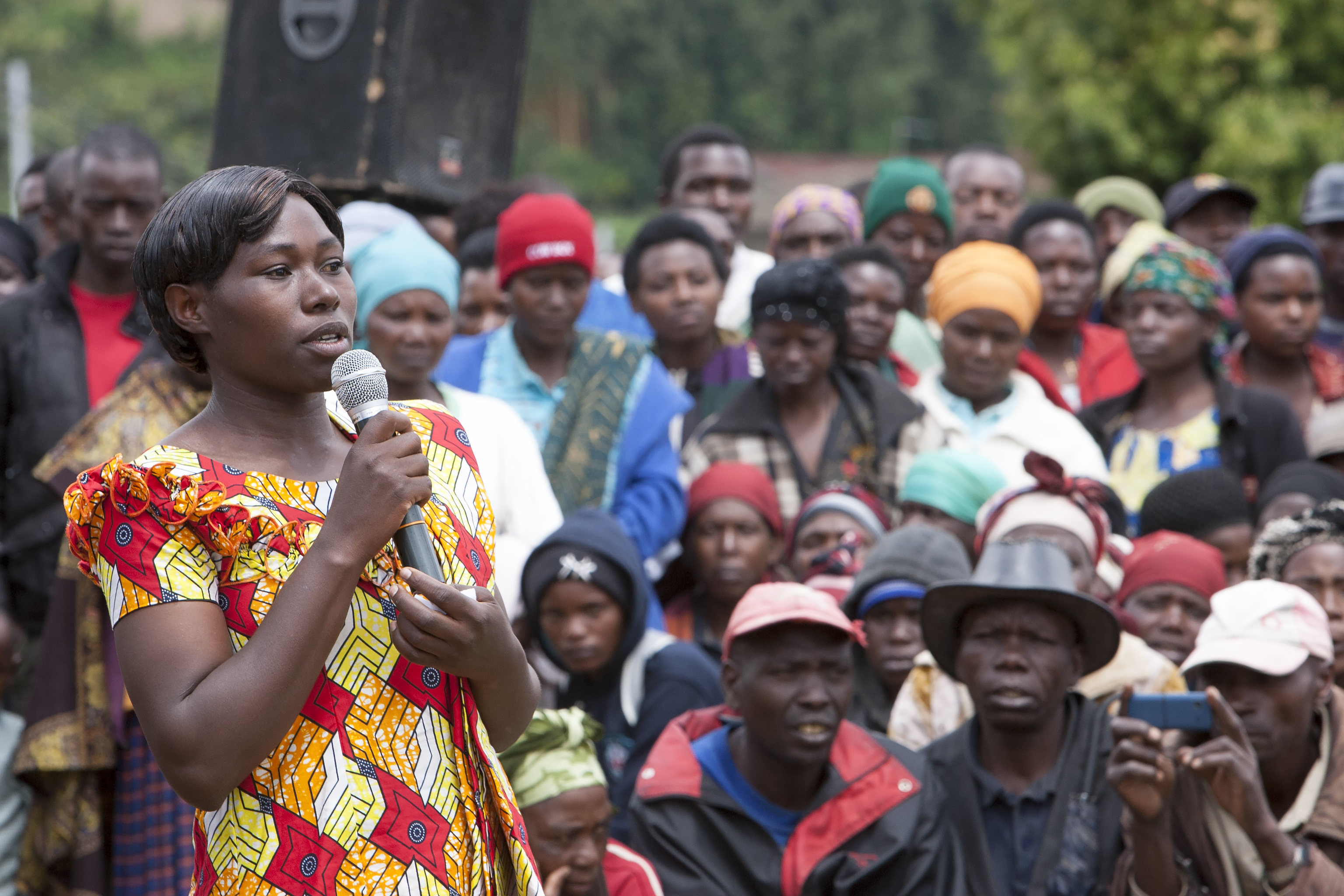 Photo credit: A female employee at a land husbandry site in Nyabihu District, Rwanda, addresses her fellow workers. The site employs about 150 labourers of which 60% are women. Photo: Simone D. McCourtie / World Bank.