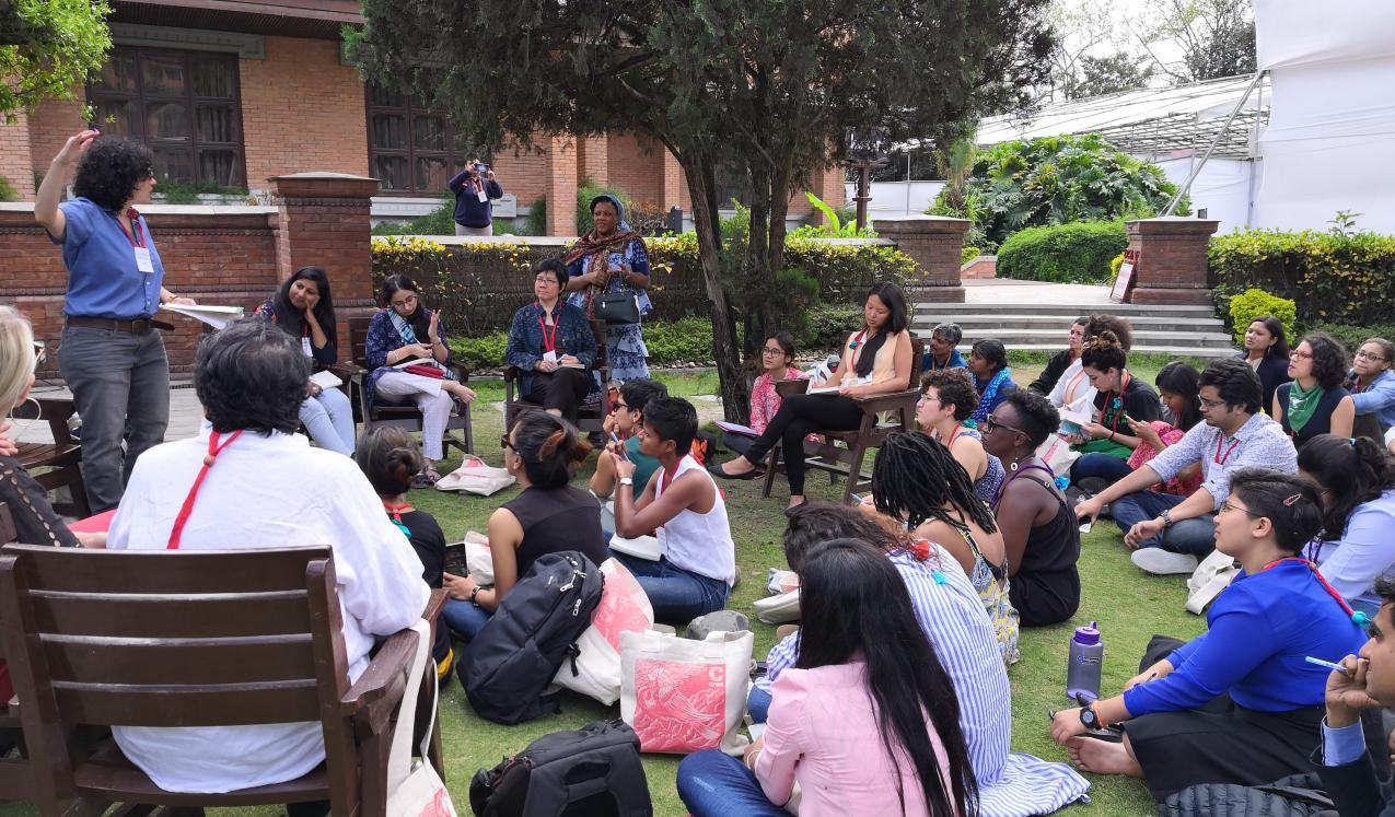 Participants sat outside at the conference