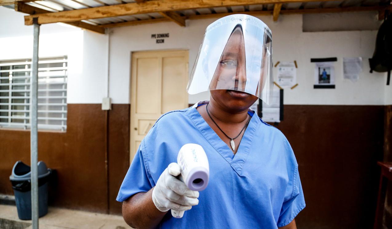Entering the isolation unit at Connaught Hospital, Freetown, Sierra Leone ©Simon Davis/DFID