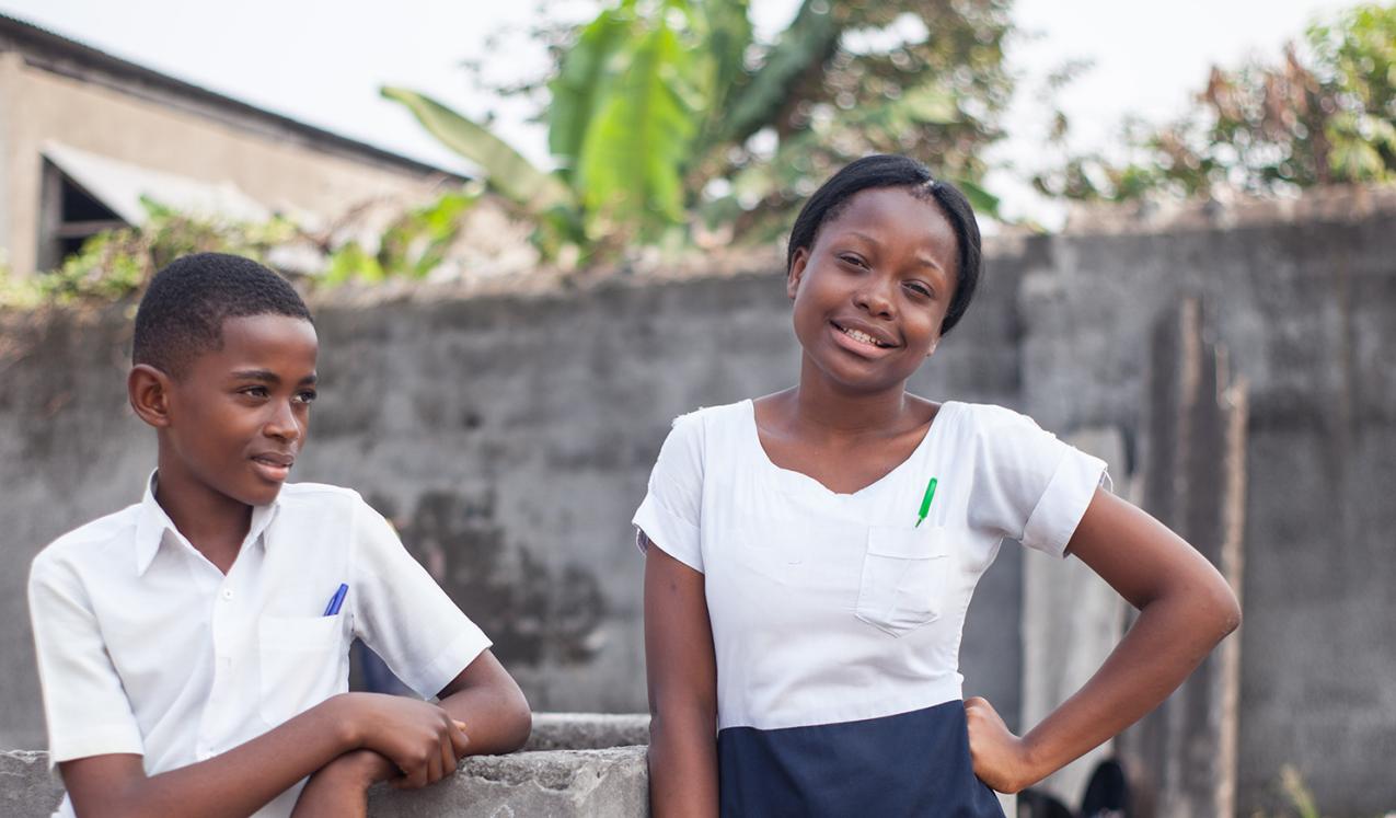 Two adolescent school children. © Passages