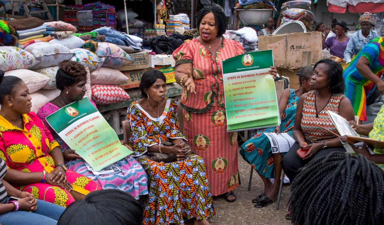 Informal workers gather for a meeting of their association, the Makola Market Traders Union, in Accra, Ghana. The union is dominated by women and the strength in numbers provides some protection to traders. Credit: Jonathan Torgovnik/Getty Images/Images o