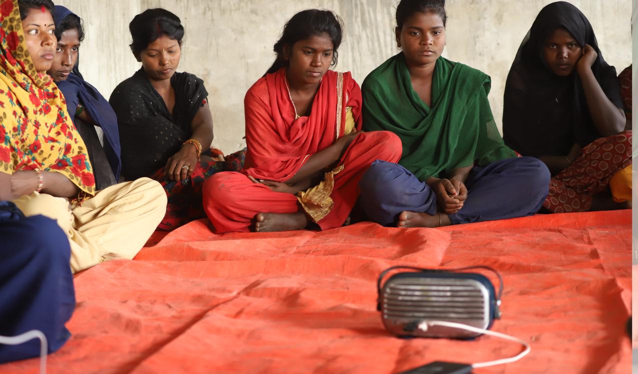 Girls in Eastern Terai, Nepal meet twice a week to listen PMC's 'Hilkor (Ripples in water)' Drama. The drama covers the story of child marriage and gender based violence. ©PMC