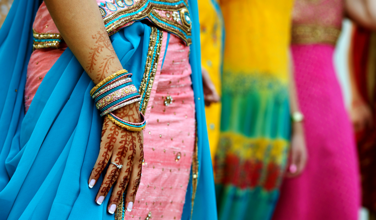 A young women's hand with henna tattoos and a diamond ring. ©infinity21/shutterstock