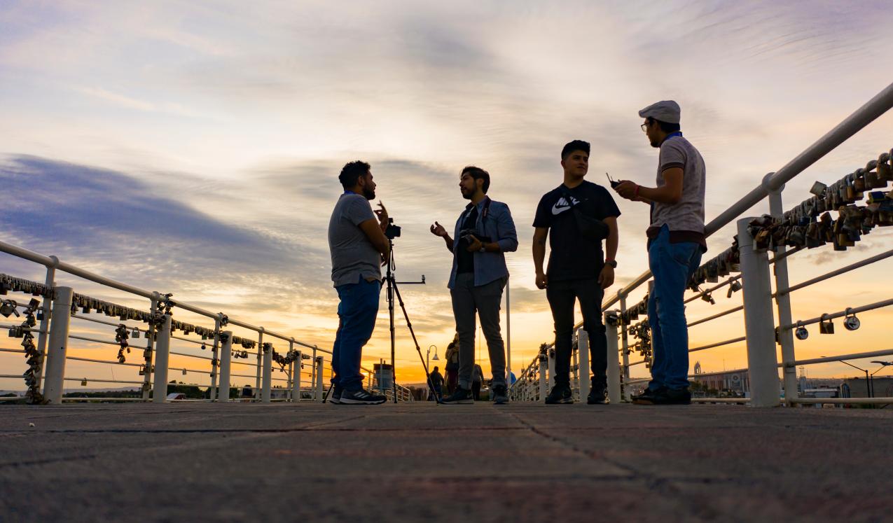 Guanajuato, Mexico, 2019: group of men talking on the famous bridge of love. © Aberu.Go/shutterstock.
