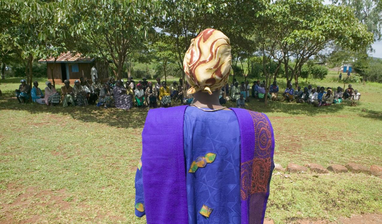 Sarah Kilemi, wife of Parliament member Kilemi Mwiria, speaks to "Women without Husbands" who have been ostracized from society. Meru, Kenya, 2007. © Shutterstock/Joseph Sohm ID:105700322