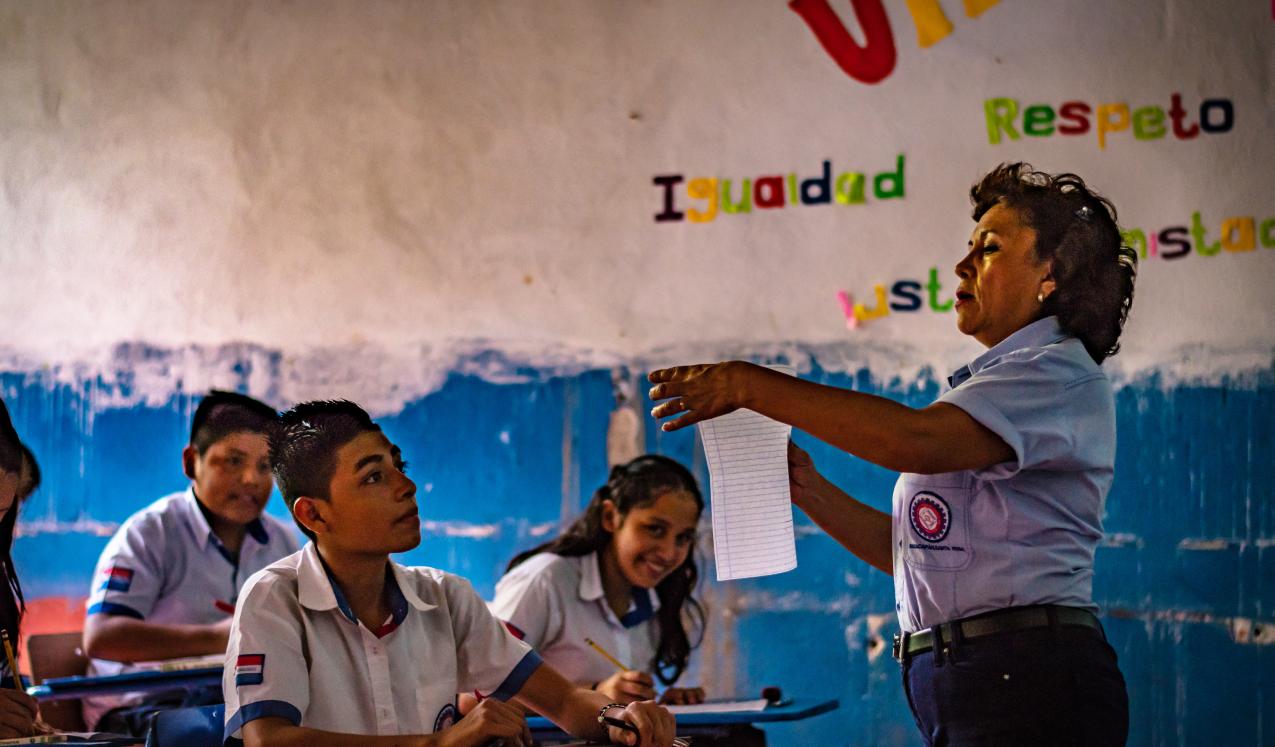 Students and teacher at a college in Guatemala. © ShutterPrice | Shutterstock ID: 1223048173