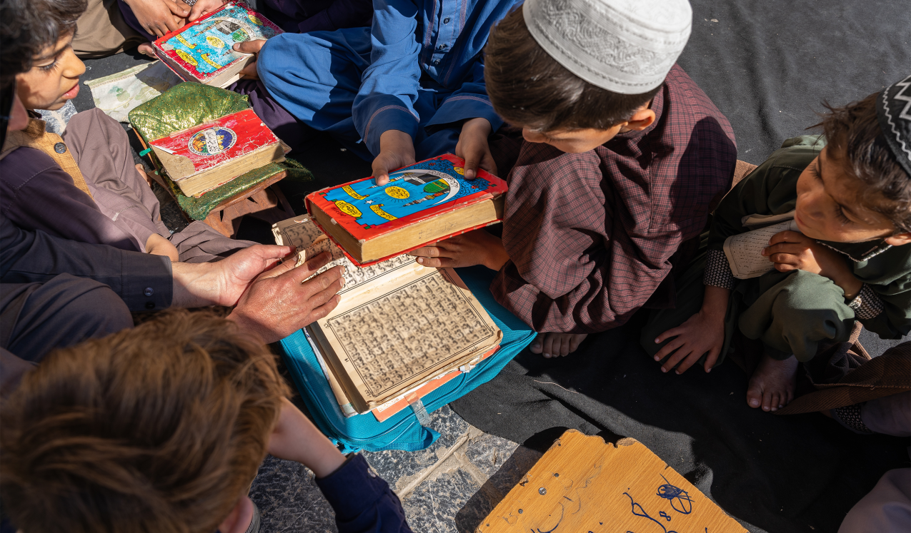 Mullah teaching children Qur’an Sharif Darsi and Nurani Qaida in Kandahar, Afghanistan, April 2025 © Tuzla | Shutterstock