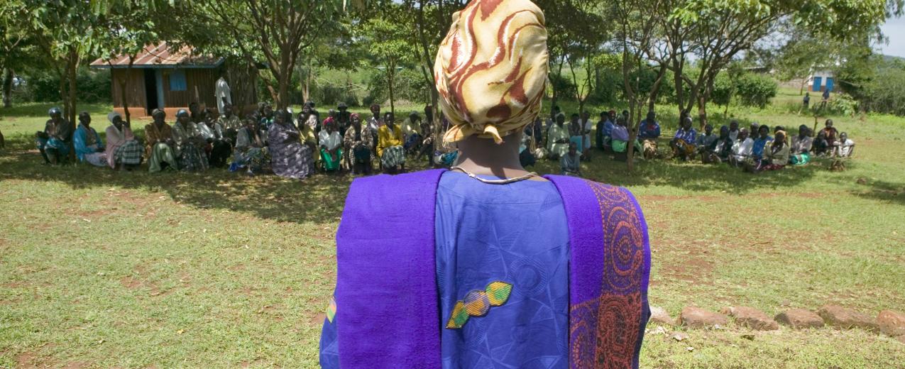 Sarah Kilemi, wife of Parliament member Kilemi Mwiria, speaks to "Women without Husbands" who have been ostracized from society. Meru, Kenya, 2007. © Shutterstock/Joseph Sohm ID:105700322