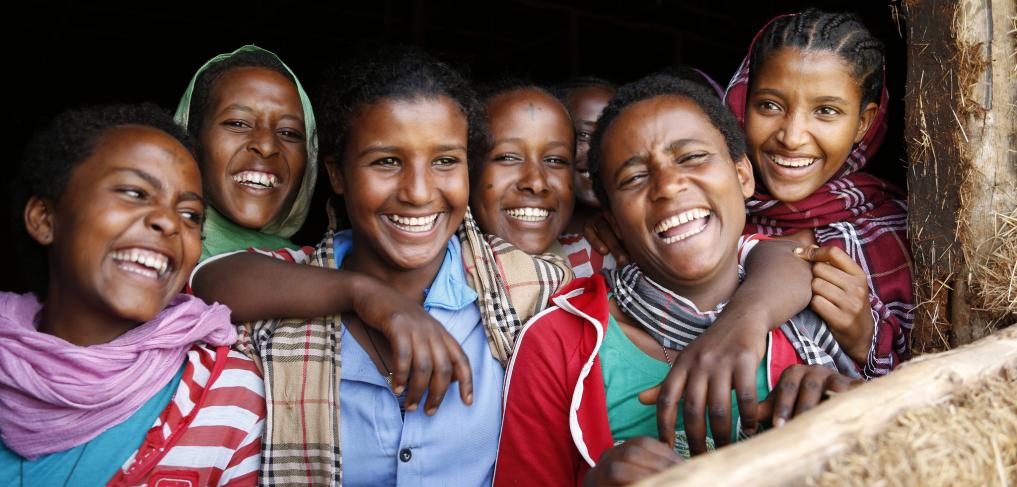 Girls laughing at a school in Ethiopia. Copyright: DFID