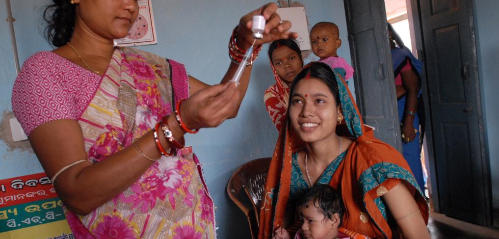 Community health worker, Rebati, gives polio and other life saving vaccinations to babies like Adilya for at least the first year of their lives. Copyright: DFID