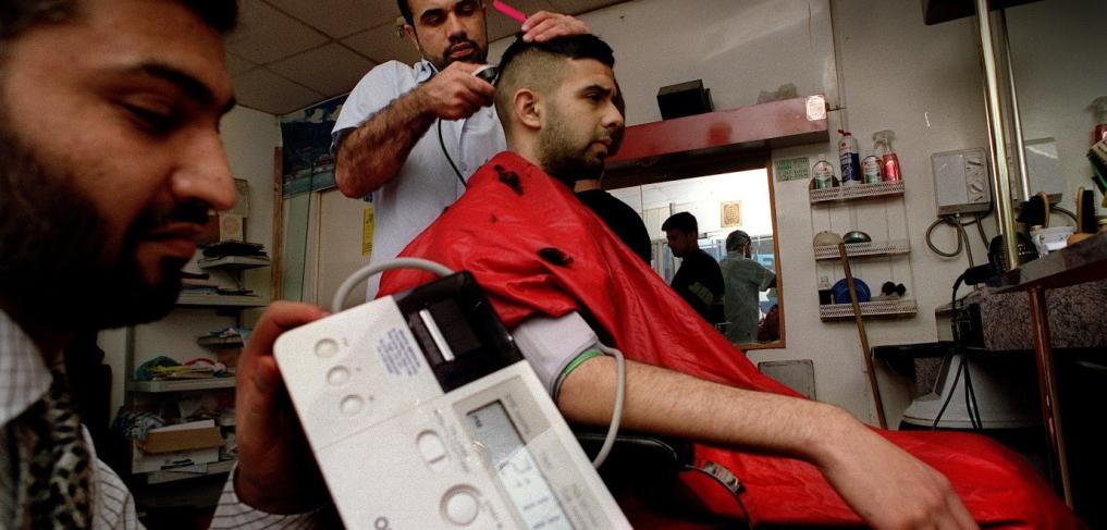 Health checks for men at a barbers’ shop in Bradford UK. © Bradford Health of Men project