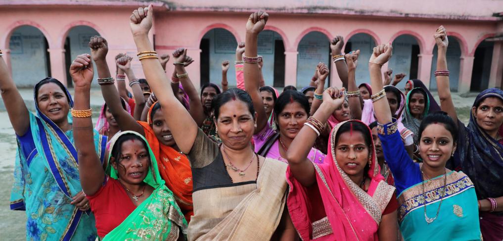 Elected Women Representatives (EWRs) gather outside Middle School Harka in Sitamarhi district, India, to discuss community issues. © Paula Bronstein/Getty Images/Images of Empowerment