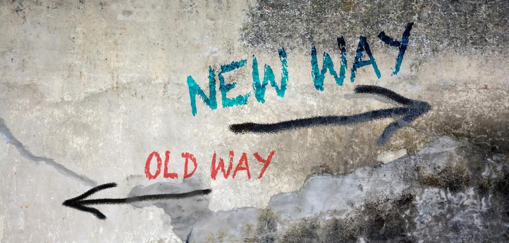 Wall Graffiti saying new way, old way with arrows. © Pixelvario/Shutterstock ID: 1409350979