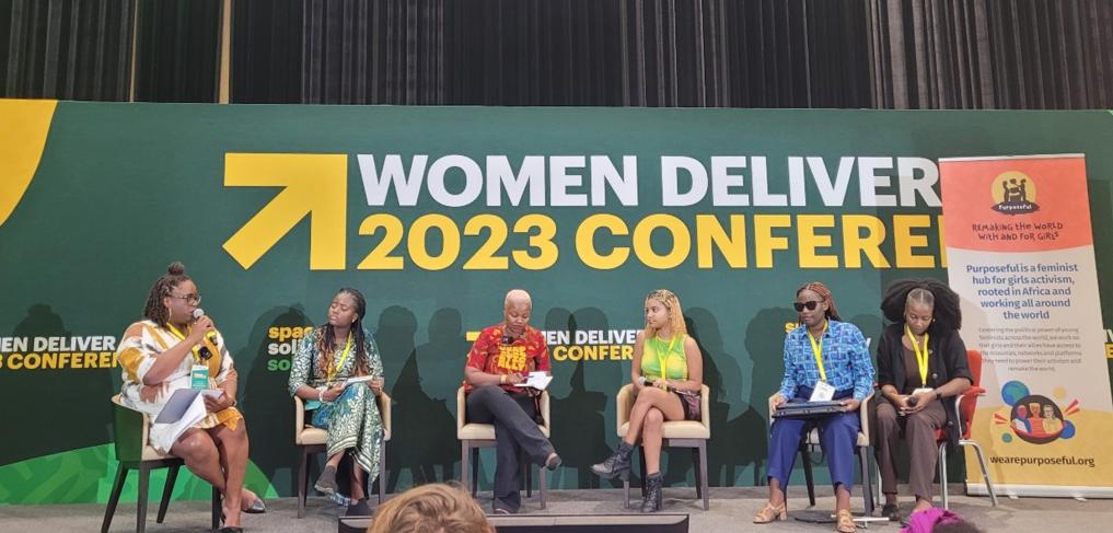 Youth delegates on stage at Women Deliver 2023 ©Natasha Wright