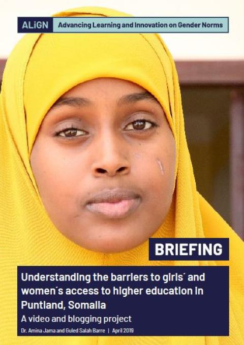 A Somalian adolescent girl wearing a bright yellow head scarf looks at the camera. ©SIDRA