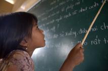 A student of Khmer descent learns Kinh language (the official Vietnamese language) at the Lac Hoa Primary School in Soc Trang province. Copyright: World Bank