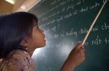 A student of Khmer descent learns Kinh language (the official Vietnamese language) at the Lac Hoa Primary School in Soc Trang province. Copyright: World Bank