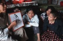 Local NGO staff teaching sex workers about the risk of HIV/AIDS. Cambodia. Photo: © Masaru Goto / World Bank