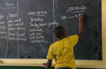 At student writing on a board. © Sarah Farhat / World Bank ID: 20170317-Tanzania-Farhat-8282