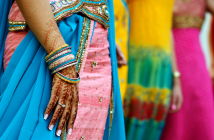 A young women's hand with henna tattoos and a diamond ring. ©infinity21/shutterstock