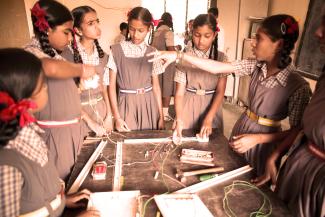 Girls working together on an activity at a school in India. Credit: Charlotte Anderson