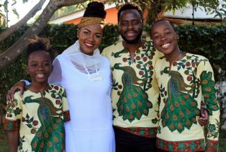 Lelemba with her husband, Sandras, and two sons Mwai, 12, and Mwenda, 16