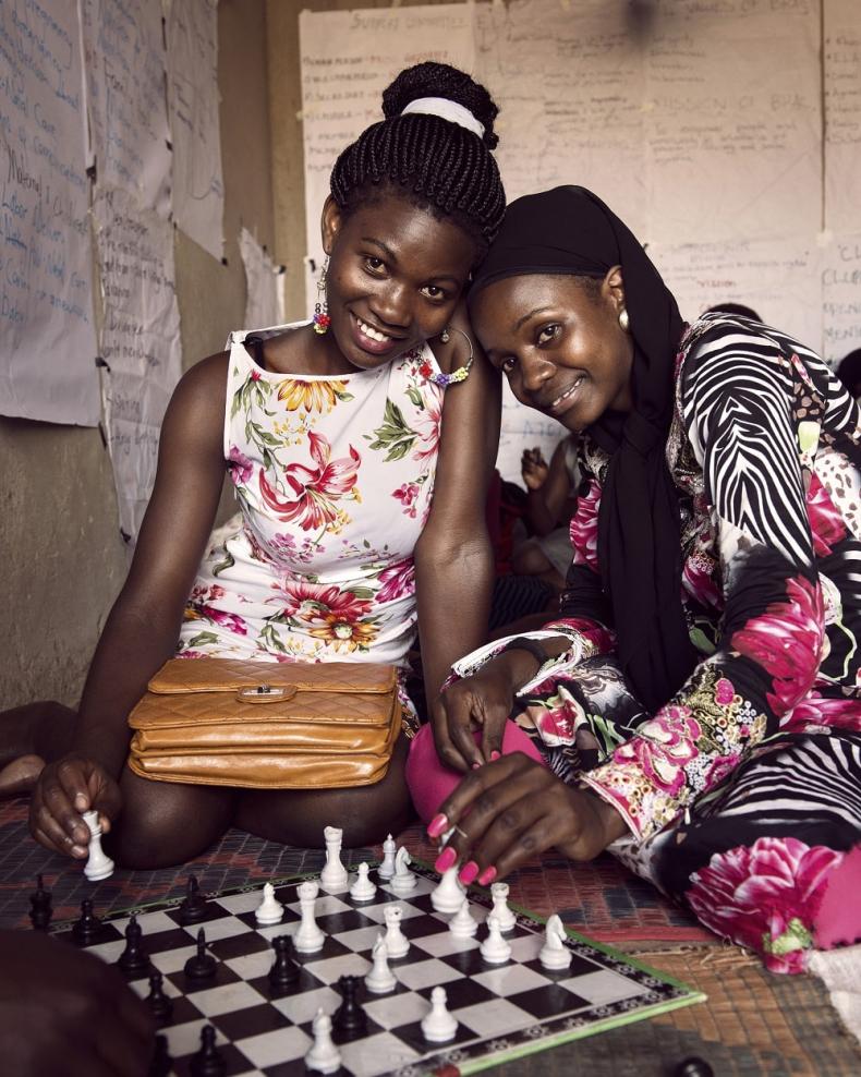 Two girls playing chess