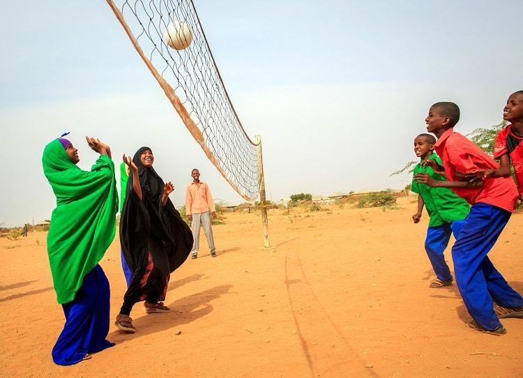 Students playing volleyball