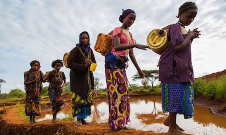 Women going to collect water