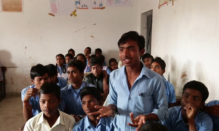 Young India men in a classroom. @ICRW Asia