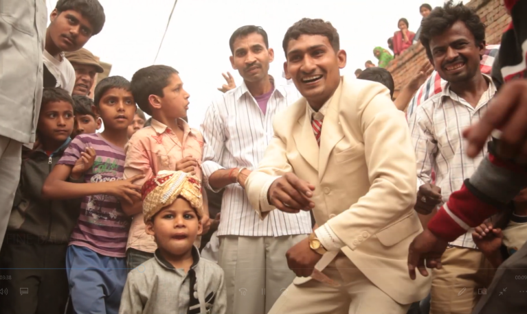 Young India men and boys at a celebration @ICRW Asia 