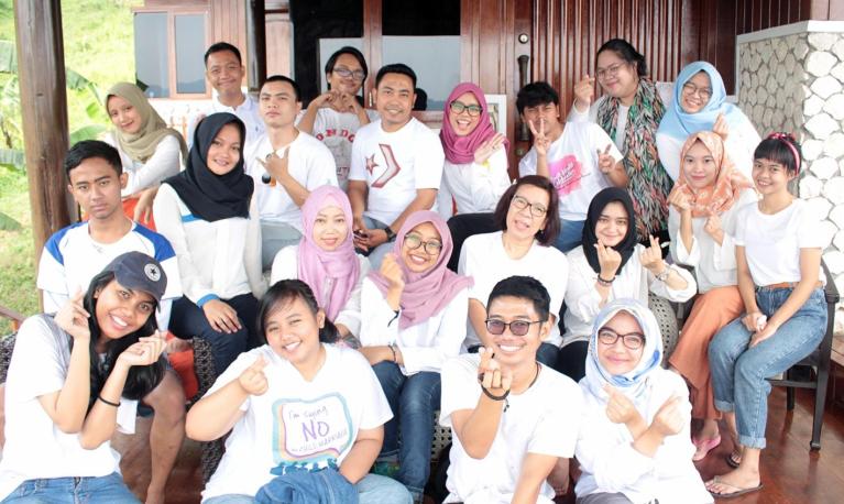 Adolescents in Indonesia pose for a photo.