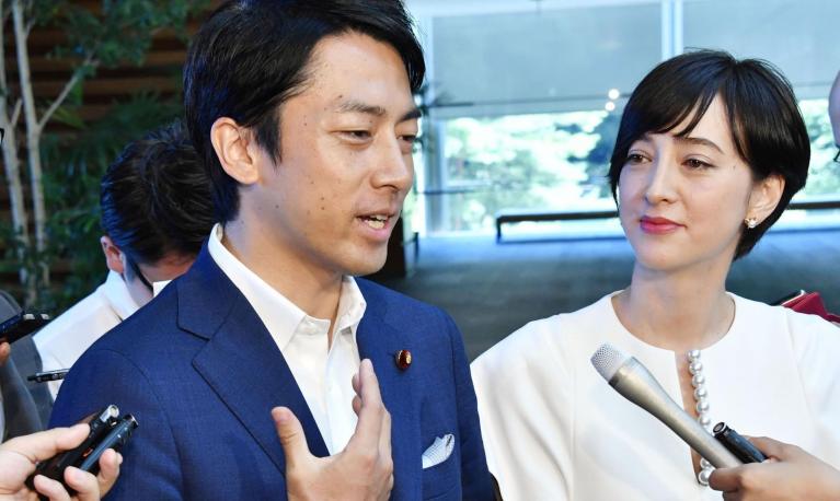 Shinjiro Koizumi with his wife, Christel Takigawa. Japan’s leave provision is among the most generous in the world. Photograph: Yoshitaka Sugawara/AP