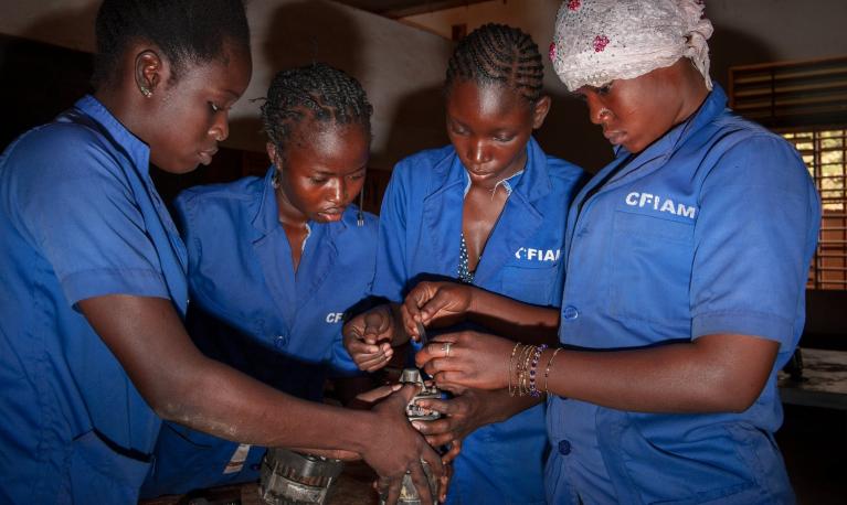 A class for auto mechanic at the CFIAM all-female school in Ouagadougou. ©Jean-Marc Caimi & Valentina Piccinni/The Guardian