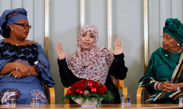 Nobel Prize winner and Liberian peace activist Leymah Gbowee, human rights activist Tawakul Karman from Yemen, and Liberian President Ellen Johnson-Sirleaf at a conference in Oslo on Dec. 9, 2011. REUTERS/Leonhard Foeger
