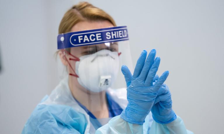 Some female staff are reported to have developed ulcers on their faces from ill-fitting PPE. Photograph: Jon Super/AP