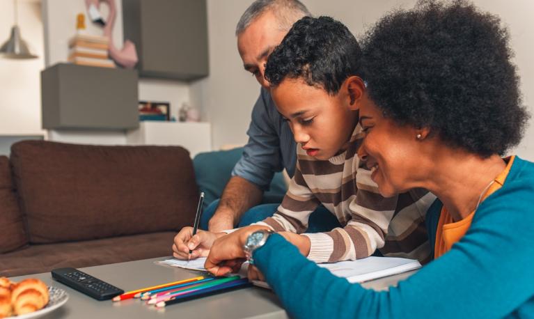 Parents helping child with homework © Institute for Fiscal Studies