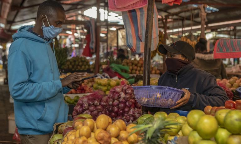 A market seller in Kenya. ©World Bank / Sambrian Mbaabu