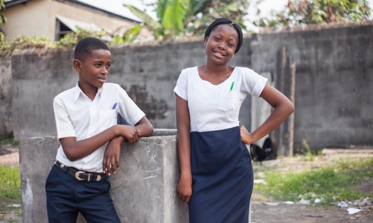 Two adolescent school children. © Passages