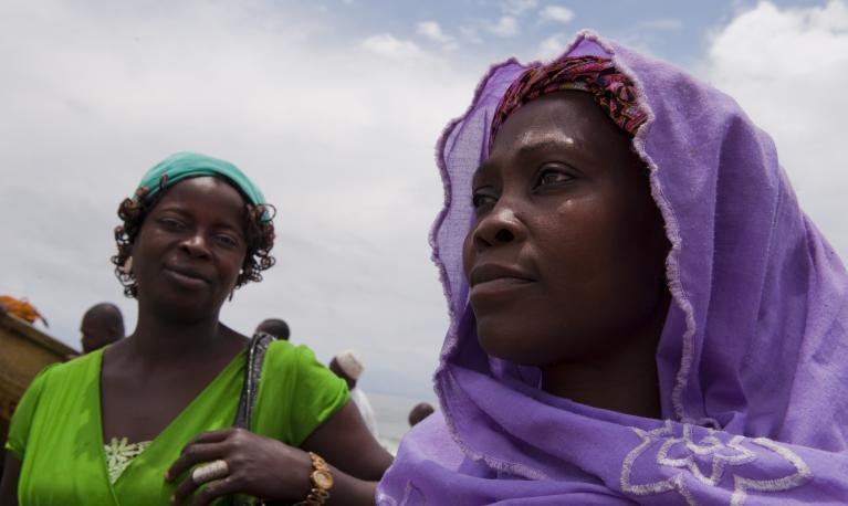 Two women in Orimedu, a fishing village, in Lagos State, Nigeria. 