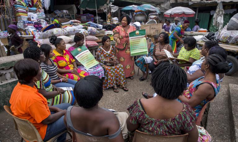 Informal workers gather for a meeting of their association, the Makola Market Traders Union, in Accra, Ghana. The union is dominated by women and the strength in numbers provides some protection to traders. Credit: Jonathan Torgovnik/Getty Images/Images of Empowerment