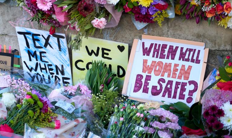 Flowers with messages about women’s safety left by people who attended a vigil for Sarah Everard in Clapham Common. March 2021, London. Credit: Vincenzo Lullo/Shutterstock.com