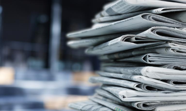 Pile of fresh newspapers. © Billion Photos/Shutterstock/1665903517
