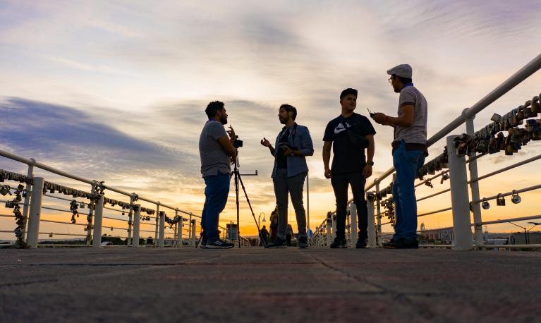 Guanajuato, Mexico, 2019: group of men talking on the famous bridge of love. © Aberu.Go/shutterstock.