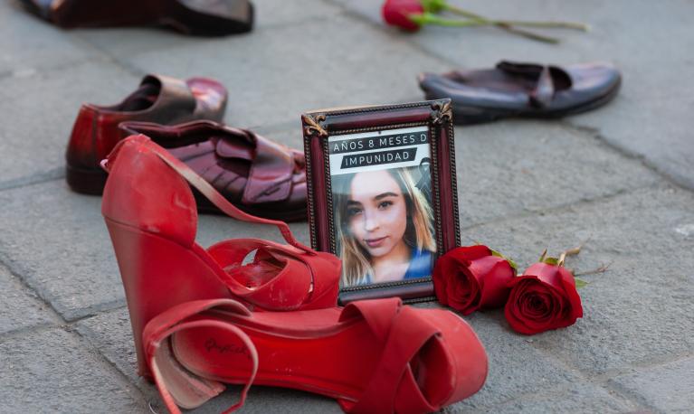 Relatives protest by placing red shoes to pay tribute to the hundreds of disappeared women in Juarez and across Mexico. ©David Peinado Romero / Shutterstock ID: 2128849571