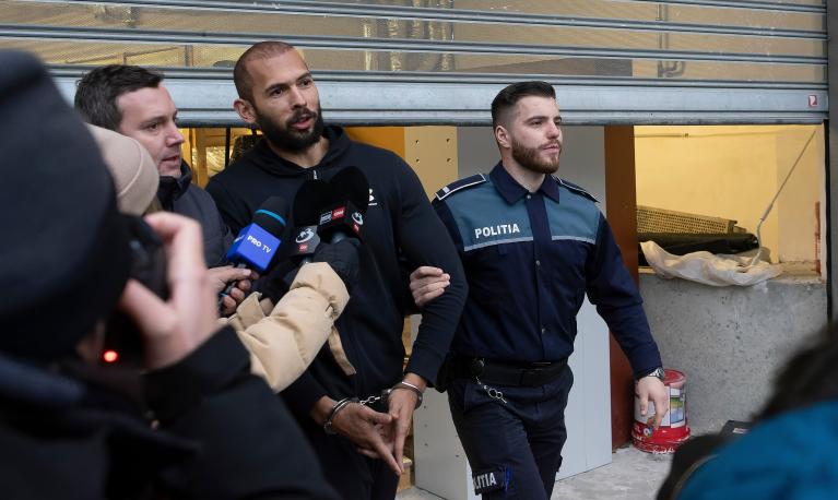 Andrew Tate in policy custody in Bucharest, Romania. © LCV/ Shutterstock ID: 2254142455