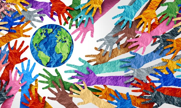 A collage of brightly coloured paper hands reaching towards a paper earth. © Lightspring | Shutterstock ID: 1814911268