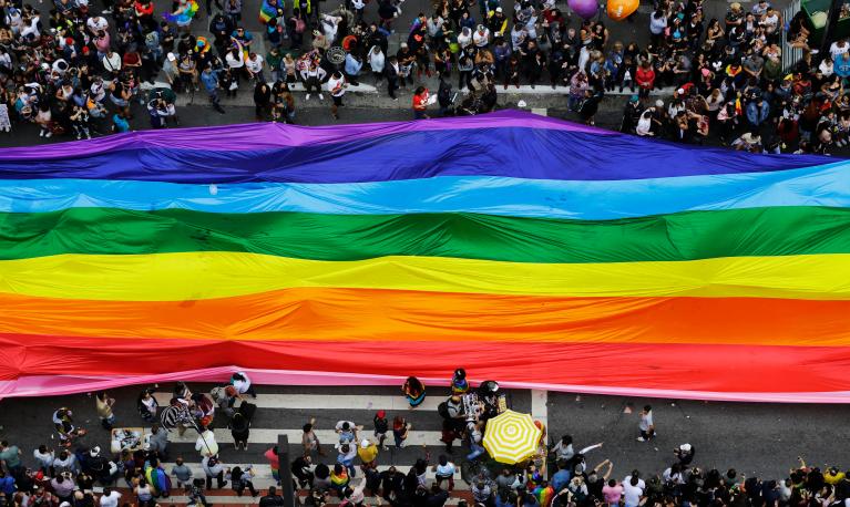 A giant rainbow being carried down the streets during the Pride parade in Sao Paulo, Brazil, 2018. © Nelson Antoine | Shutterstock ID: 1415682524